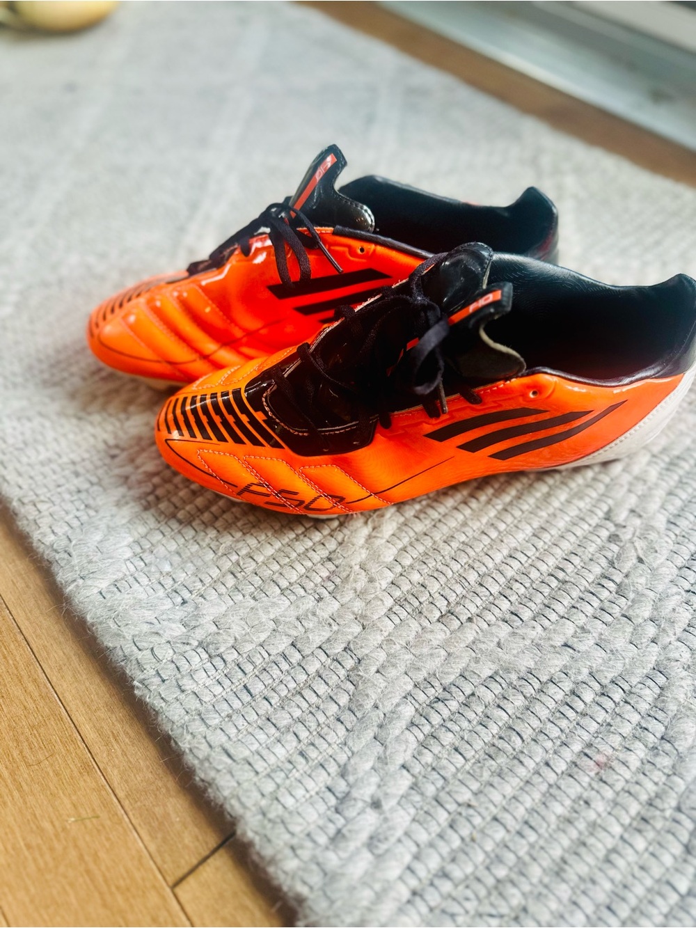 Adidas f50 Men’s Bright Orange and Black Soccer Sneakers